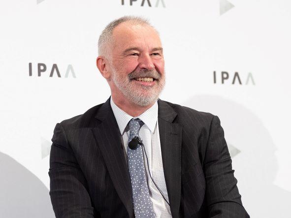 Dr Gordon de Brouwer profile picture with an Institute of Public Administration Australia (IPAA) background