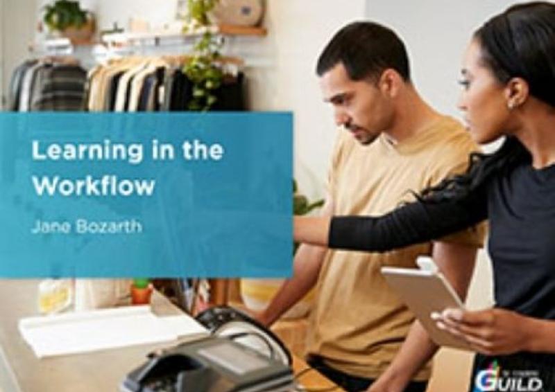 Illustrative photo image of a woman and a man in a retail clothes shop with the woman giving instructions to the man on how to undertake a task.