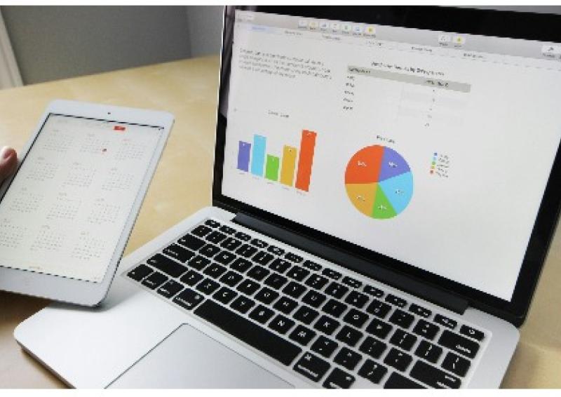 Laptop and tablet showing different views of data