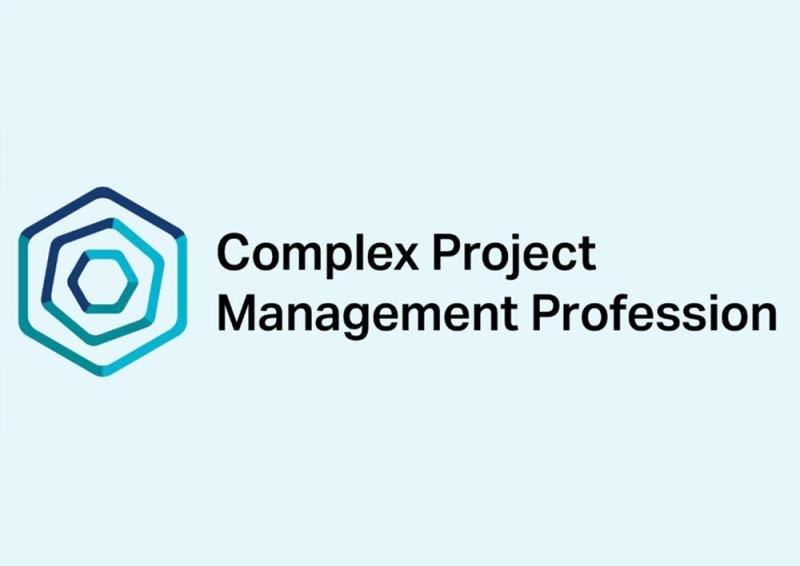 A logo for the CPM Profession that show the words, “Complex Project Management Profession” with an illustrative circle of shapes to the left and right of the words.