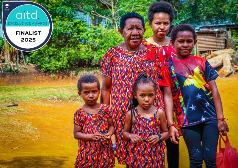 PNG family photo with AITD excellence awards logo in corner.