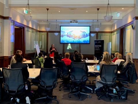 Photo of ALCC event at Museum of Australian Democracy meeting room with Kate Harris facilitating the workshop.