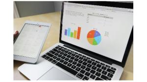 Laptop and tablet showing different views of data